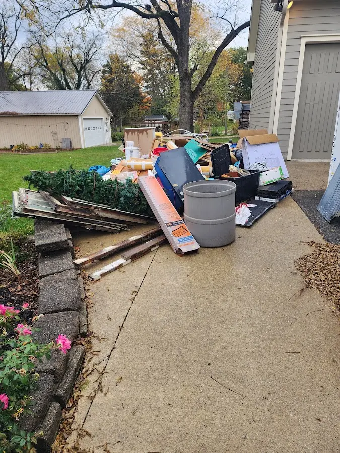 Dumpster being loaded with debris for 30 Yard Dumpster Rental in Schererville